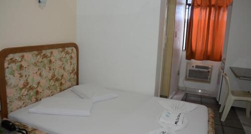 Ein Bett oder Betten in einem Zimmer der Unterkunft Hotel Don Juan