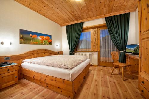 Postel nebo postele na pokoji v ubytování Hotel Duc De Rohan