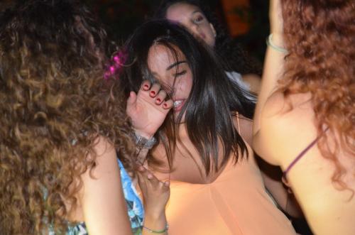 two young women in a party with their hair at Ostello Salento in Alezio