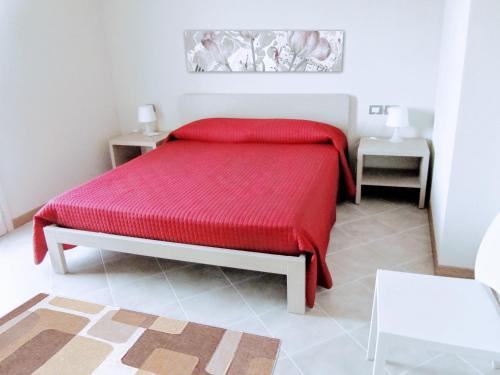 Ένα ή περισσότερα κρεβάτια σε δωμάτιο στο Residence San Rossore
