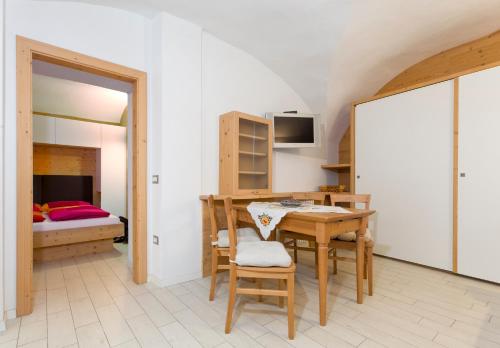 Postel nebo postele na pokoji v ubytování Residenza Al Cadin