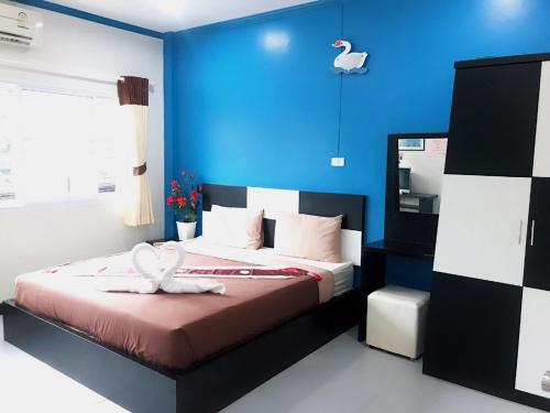 Ένα ή περισσότερα κρεβάτια σε δωμάτιο στο Sam Resort Chaam