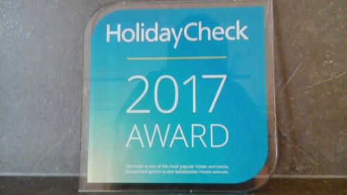 a sign for a holiday check for a award at Drei Tannen in Bodenmais
