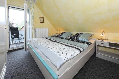Postel nebo postele na pokoji v ubytování Ferienwohnungen Haus Sternenlicht