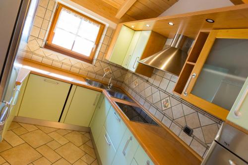 Kuchyň nebo kuchyňský kout v ubytování Chalet Champagne