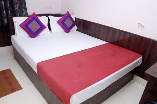 Ένα ή περισσότερα κρεβάτια σε δωμάτιο στο Viva Guest House