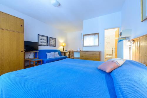 Postel nebo postele na pokoji v ubytování Apartments Giardino