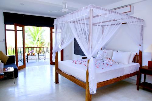Una cama o camas en una habitación de Malu Banna