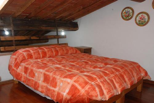 Postel nebo postele na pokoji v ubytování Agriturismo Olmi Grossi