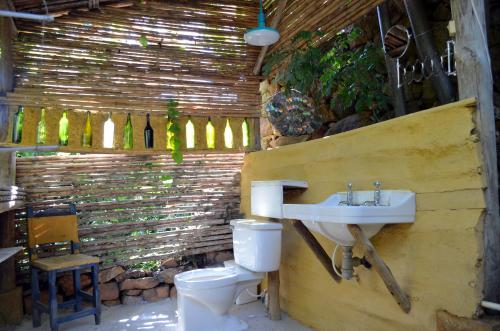 a bathroom with a sink and a toilet at Casa Taller in Barichara
