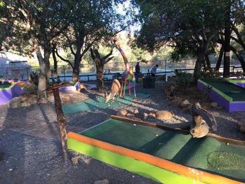 a park with a play park with a playground at Mabalingwe Elephant Lodge in Bela-Bela