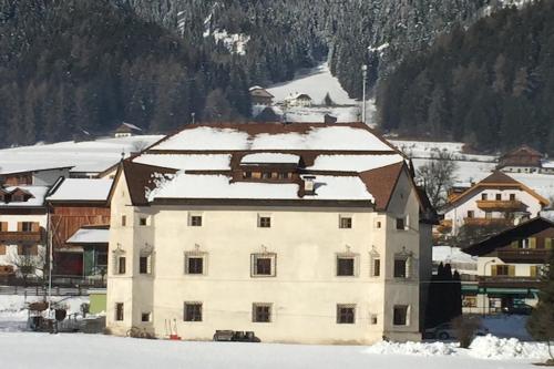 Mansarda Dolomiti semasa musim sejuk