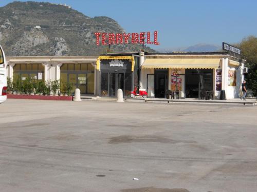 an empty parking lot in front of a building at Grand Hotel Pavone in Cassino