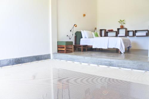 Katil atau katil-katil dalam bilik di Casa de Piedra Tulum