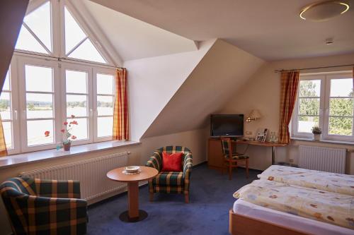 Postel nebo postele na pokoji v ubytování Flair Landhotel Strengliner Mühle