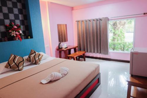 Postel nebo postele na pokoji v ubytování Great Hill Resort