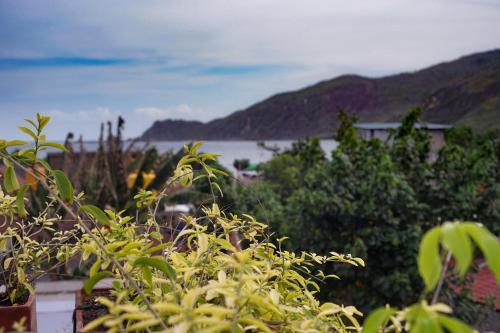 a view of a body of water from a house at Rawa Lombok in Kuta Lombok