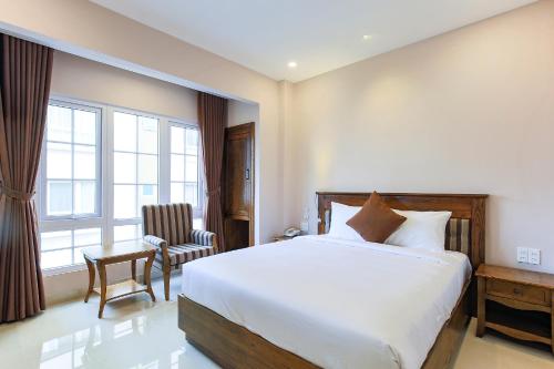 Katil atau katil-katil dalam bilik di Hoang Lan Hotel