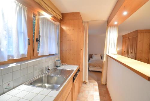 a kitchen with a sink and a counter top at Studio Grands Ducs 222 in Verbier