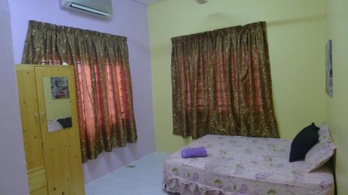 Кровать или кровати в номере D'elzarra Home