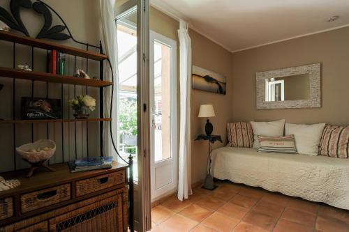 A bed or beds in a room at Les Ilets de L'Eau Blanche