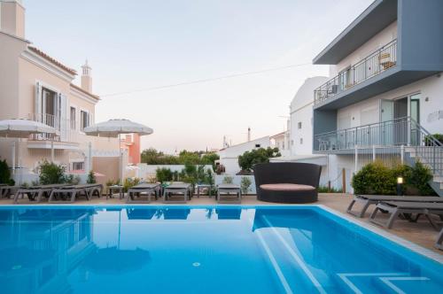 a view of a swimming pool in a apartment at Boutique & Villas Boliqueime in Boliqueime
