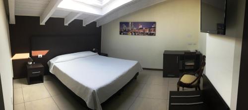Postel nebo postele na pokoji v ubytování Residenza S.Event B&B
