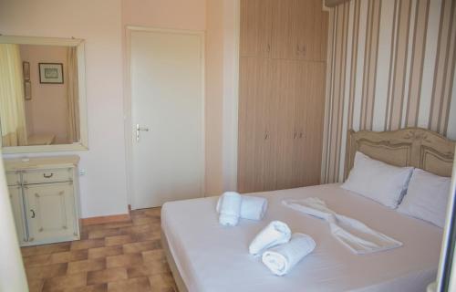 Voodi või voodid majutusasutuse Villa Riza toas