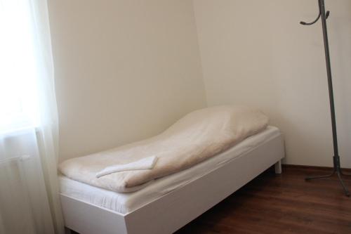 Postel nebo postele na pokoji v ubytování Fredry 8