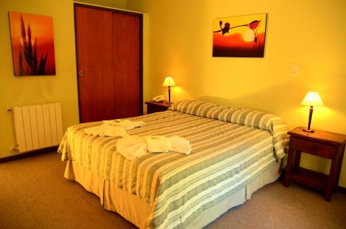 Paradiso Hotelにあるベッド