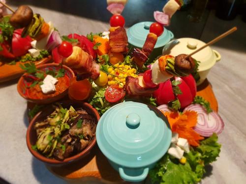a plate of food with different types of food at Podgorski An in Kolešino