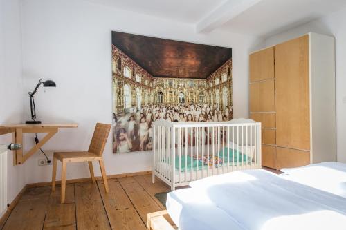 Vuode tai vuoteita majoituspaikassa "goethezimmer" Ferienwohnung und Zimmer am Burgplatz