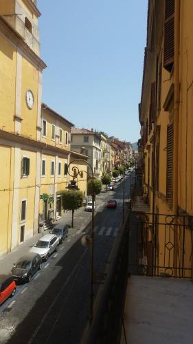 a view of a street with cars parked on the road at La Casa del Sire in Marino