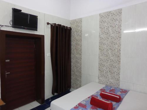 Televisyen dan/atau pusat hiburan di Luxmi Hotel
