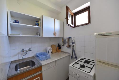 Kuhinja oz. manjša kuhinja v nastanitvi Apartmani Marko