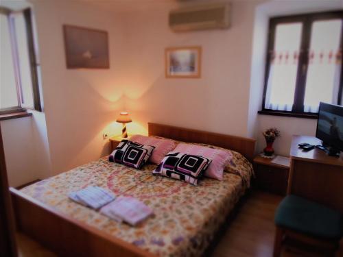 Ένα ή περισσότερα κρεβάτια σε δωμάτιο στο Apartment Noemi