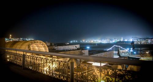 a view of a city at night at dar wassim el ghali in Rabat