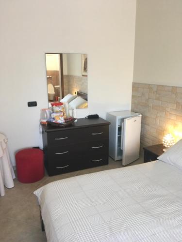 Postel nebo postele na pokoji v ubytování B&B Villa Grassi