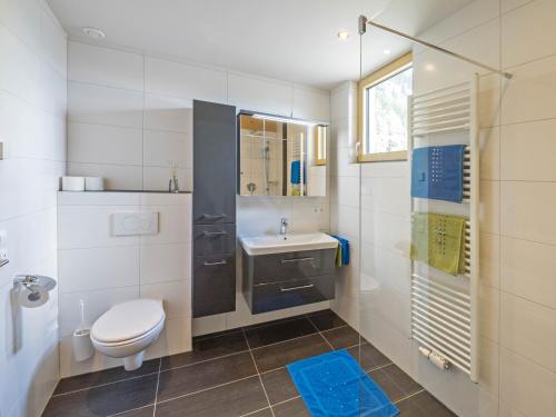 Ванная комната в Appartement Lackner mit Seeblick