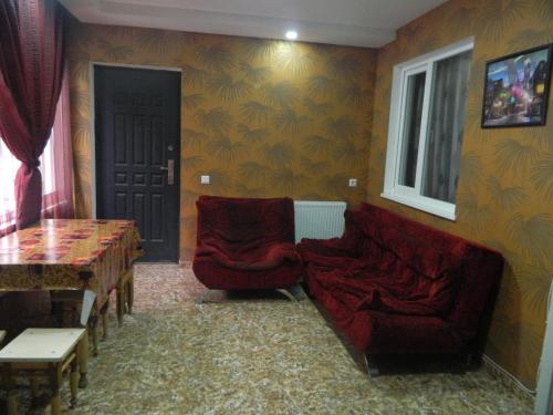 Posezení v ubytování Guest House Nua