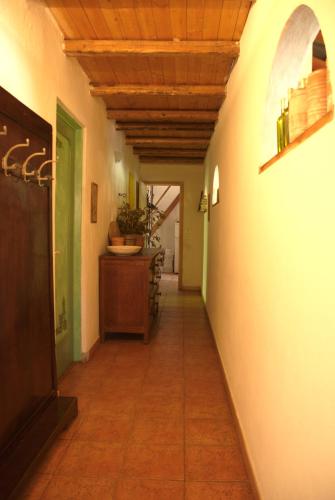 a hallway of a house with a wooden ceiling at Agriturismo Cascina degli Ulivi in Novi Ligure
