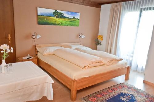 Кровать или кровати в номере Landgasthof Rössle ** Superior