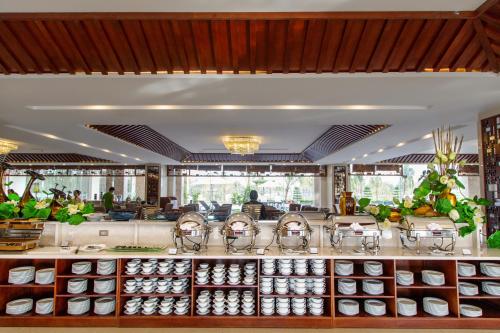 a store with a lot of products on display at Muong Thanh Holiday Hoi An Hotel in Hoi An