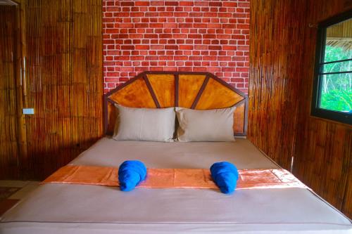 Postel nebo postele na pokoji v ubytování Cottage Hill at Lanta