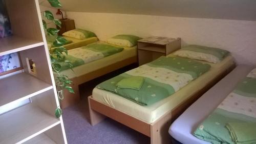 Кровать или кровати в номере Guest House Honzik