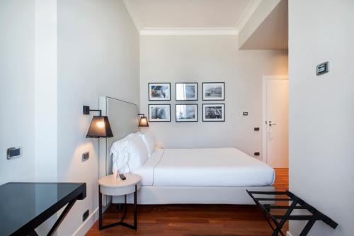 Postel nebo postele na pokoji v ubytování SeePort Hotel