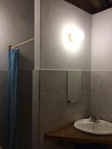 Bathroom sa Sundowner Lodge