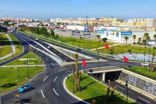 a highway with cars driving down a road at Appart Hotel Tanger Paname in Tangier