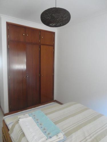 Ένα ή περισσότερα κρεβάτια σε δωμάτιο στο Apartamento KumiKata