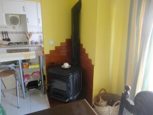 Η κουζίνα ή μικρή κουζίνα στο Apartamento KumiKata